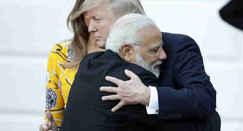 Narendra Modi and Donald Trump hugging during their meeting (AP)