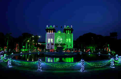 A government building in Lahore is illuminated in the colors of Pakistan's national flag in celebration of independence (Reuters)