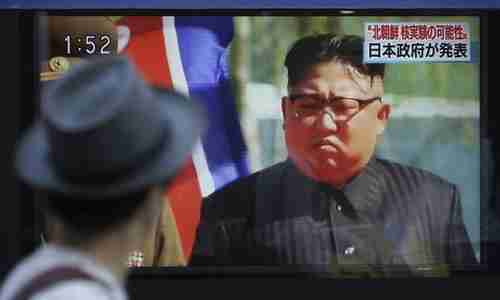 Kim Jong-un in a Japanese news broadcast being broadcast on an outdoor video screen in Tokyo. (AP)