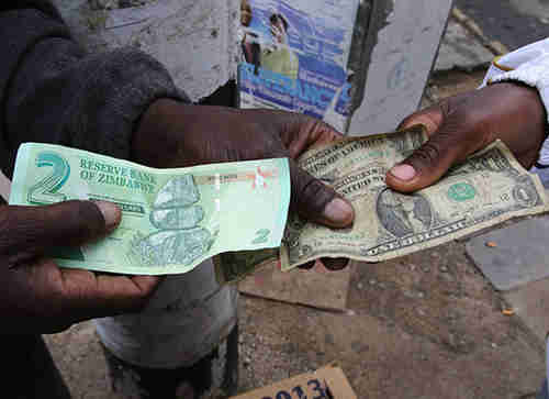 Zimbabwe bond note and US dollars (New Zimbabwean)