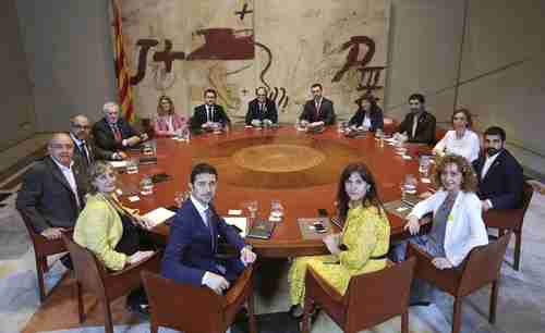 Catalonia's new government after swearing-in ceremony in Barcelona. (AP)