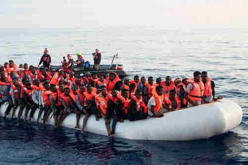 Migrants in the Mediterranean on Thursday (dpa)