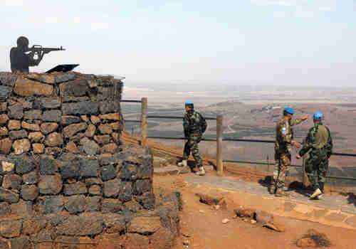 U.N. peacekeepers patrol Mount Bental, an observation post in the Golan Heights near the ceasefire line between Israel and Syria, October 23, 2017. (Reuters)