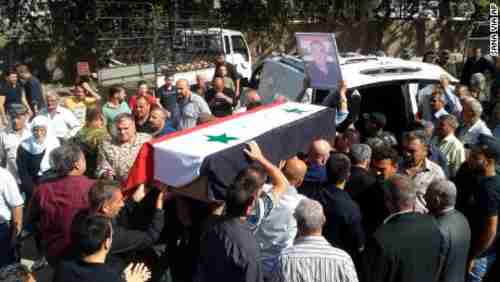 Mourners carry a coffin of one of Wednesday's victims (SANA)