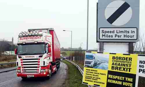 An anti-Brexit placard at the Ireland - Northern Ireland border crossing in Killeen (AFP)