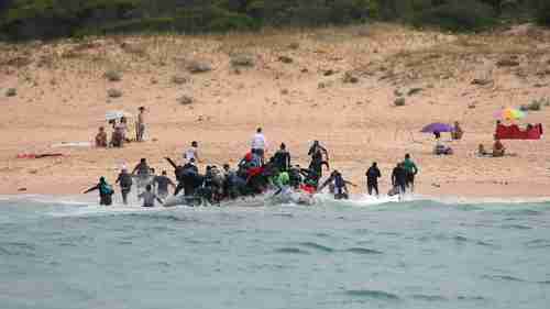 Migrants disembark at a beach in Tarifa, southern Spain, after crossing the Strait of Gibraltar (Spiegel)