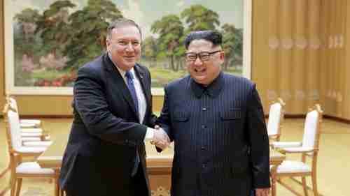 Mike Pompeo and Kim Jong-un shake hands prior to their May 9 meeting in Pyongyang (Reuters)