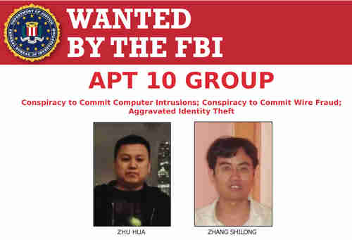 Poster showing Chinese hackers displayed at Justice Dept. press conference on Thursday