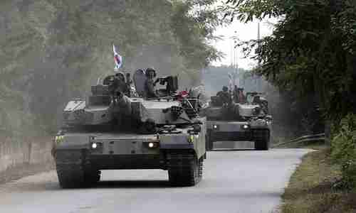 South Korean tanks take part in exercises in Paju, near the border with North Korea, on Monday. Donald Trump tweeted on Tuesday, 'I am allowing Japan & South Korea to buy a substantially increased amount of highly sophisticated military equipment from the United States.' (AP)